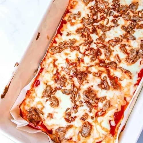 almost no carb pizza recipe in a ceramic baking dish