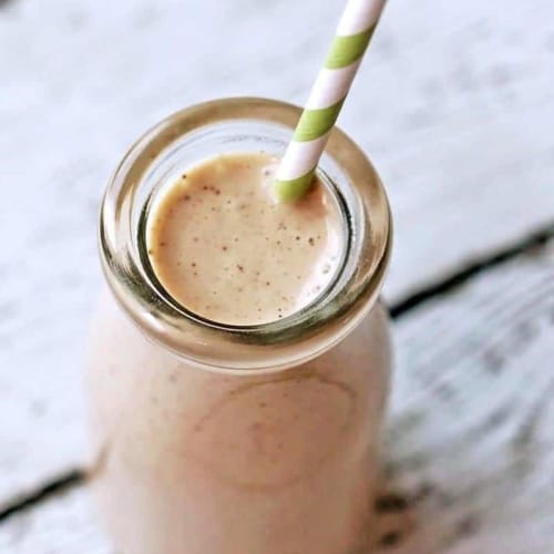 Vanilla Mint Almond Milk Protein Shake -on a white wood background