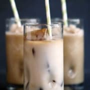 Easy Salted Caramel Iced or Frozen Coffee Recipe - Just 3 ingredients make a delicious, coffee-shop worthy iced or frozen salted caramel flavored coffee! It's dairy free too!