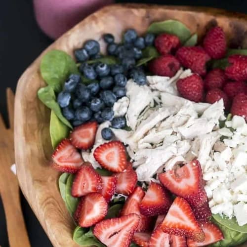 Triple Berry Chicken Salad with Spinach & Feta Cheese - enjoy this delicious fresh and fruity salad all summer long. It's refreshing and perfect for summer gatherings. Filling enough for a meal too!