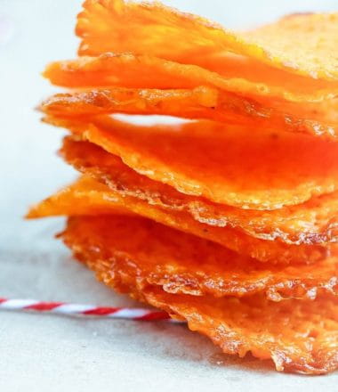 Low carb garlic cheddar cheese crisps are keto-friendly and are super easy to make & will satisfy your cravings for chips and salty snacks. Eat alone or with a low carb dip! So good!