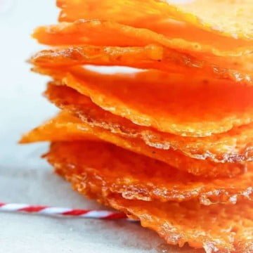 Low Carb Garlic Cheddar Cheese Crisps 10 Low carb garlic cheddar cheese crisps are keto-friendly and are super easy to make & will satisfy your cravings for chips and salty snacks. Eat alone or with a low carb dip! So good!