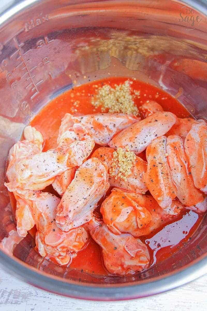 Low Carb Instant Pot Hot Wings 2 Spicy wings dipped in cool ranch is so satisfying & this low carb instant pot hot wings recipe means you can enjoy quick and easy hot wings even if you follow a ketogenic or low carb diet.