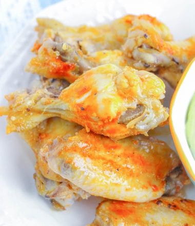 Spicy wings dipped in cool ranch is so satisfying & this low carb instant pot hot wings recipe means you can enjoy quick and easy hot wings even if you follow a ketogenic or low carb diet.