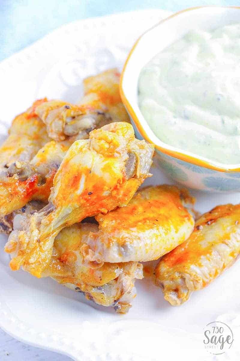 Low Carb Instant Pot Hot Wings 5 Spicy wings dipped in cool ranch is so satisfying & this low carb instant pot hot wings recipe means you can enjoy quick and easy hot wings even if you follow a ketogenic or low carb diet.