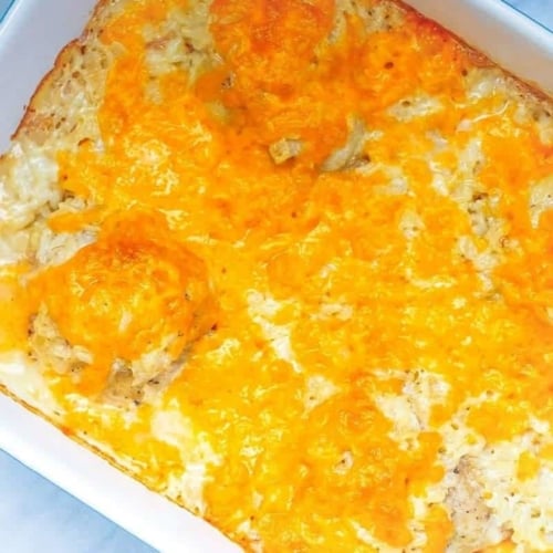 This easy cheesy chicken and rice bake is the perfect casserole recipe for busy weeknights and picky kids. Simple to make & oh-so-good!