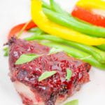 This low carb raspberry chicken will shake up your keto recipe routine with a delicious sweet & savory raspberry marinade over boneless chicken thighs.