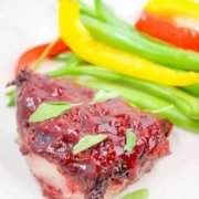 This low carb raspberry chicken will shake up your keto recipe routine with a delicious sweet & savory raspberry marinade over boneless chicken thighs.