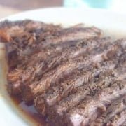 This low carb brisket recipe with coffee-chili dry rub is easy to make in a slow cooker for a delicious keto dinner. Tender and full of spicy flavor!