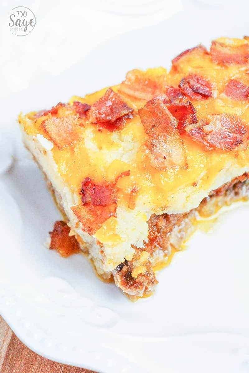 Cauliflower Casserole - Low Carb Beef And Cheese Cauliflower Casserole 2 Slice of low carb cauliflower casserole on a white plate