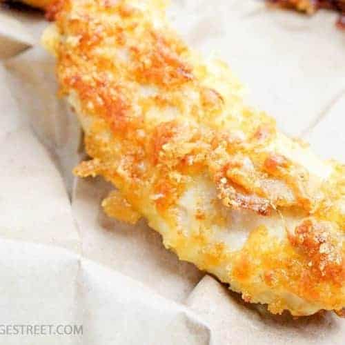 baked chicken tenders on parchment paper