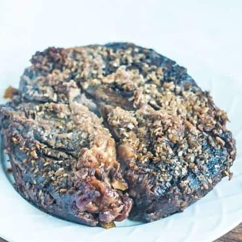 slow cooker chuck roast on a white plate