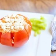 buffalo chicken dip stuffed tomato on a white plate