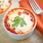 close up of low carb lasagna in a white bowl