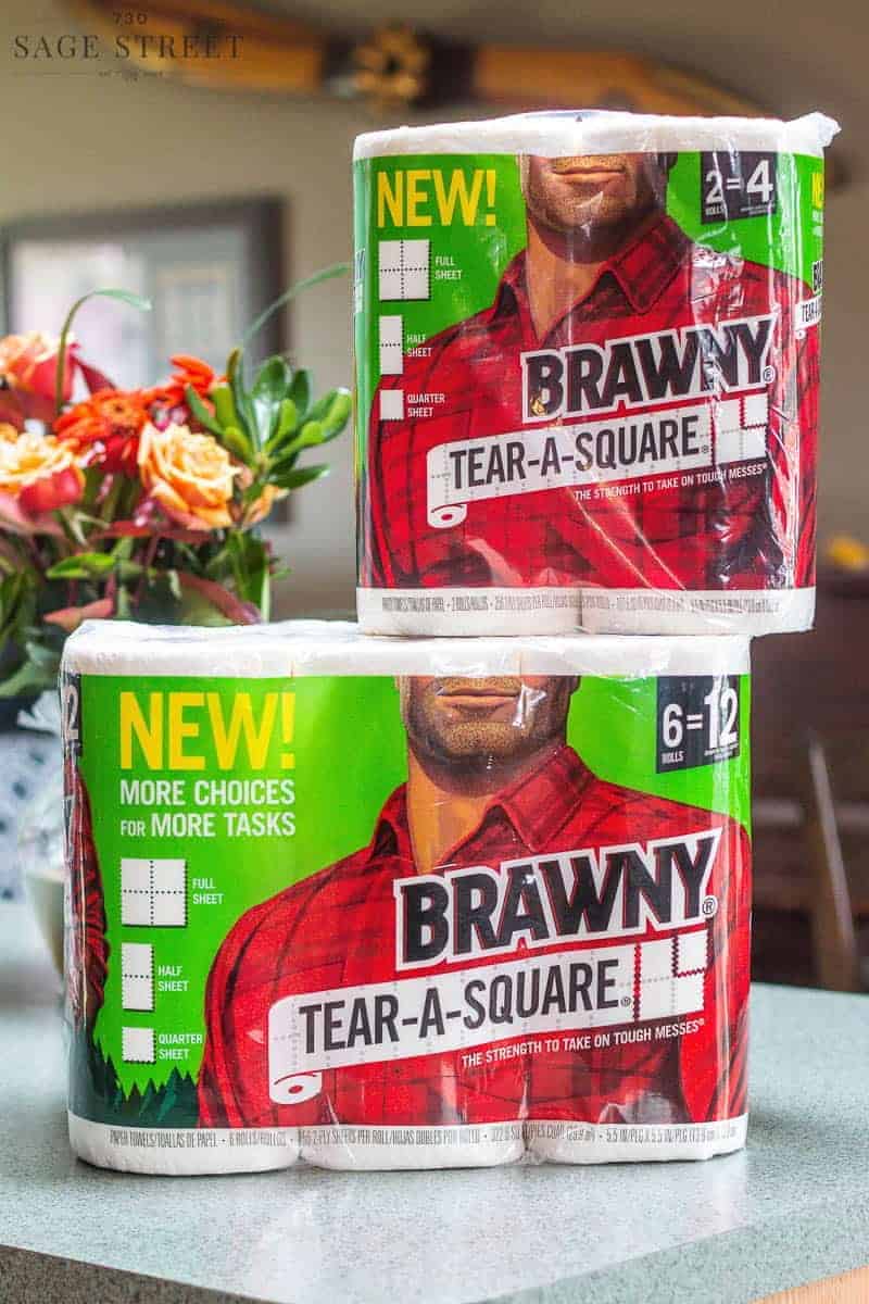 two packages of Brawny Tear-A-Square paper towels on a kitchen counter