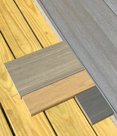 composite decking samples on a wood deck