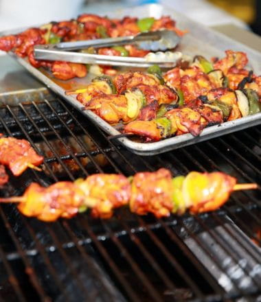 Jamaican jerk chicken on a grill