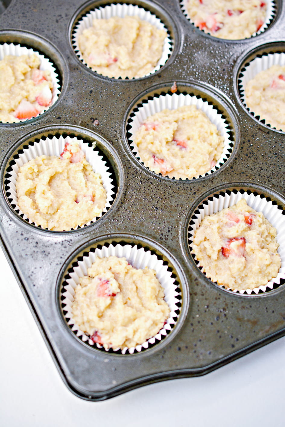 Decadent keto strawberry muffins ready for the oven.