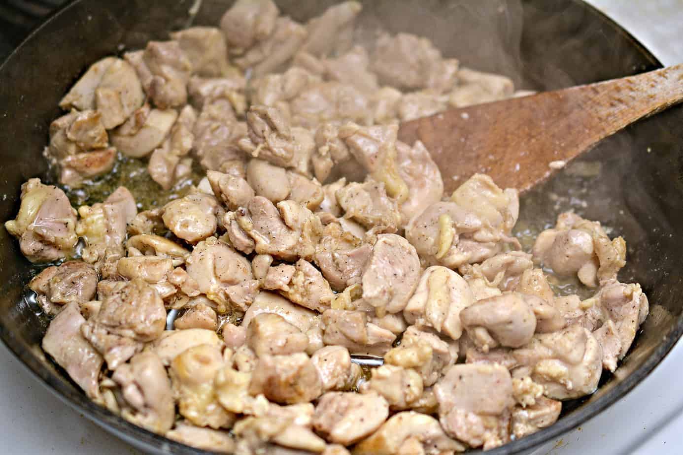 Stir the chicken frequently and fully incorporate.
