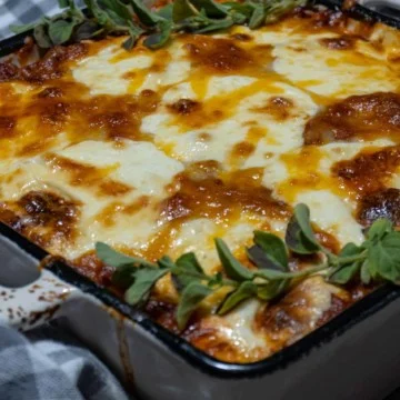 Ready to serve zucchini Lasagna in 9x9 square bowl.