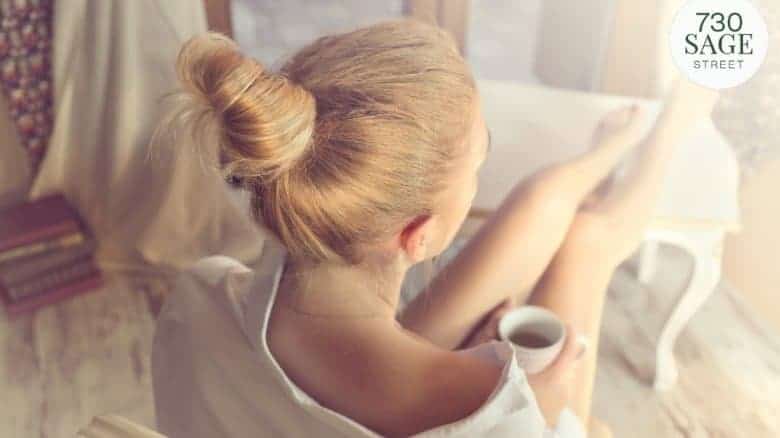 Woman pampering herself with a cup of coffee.