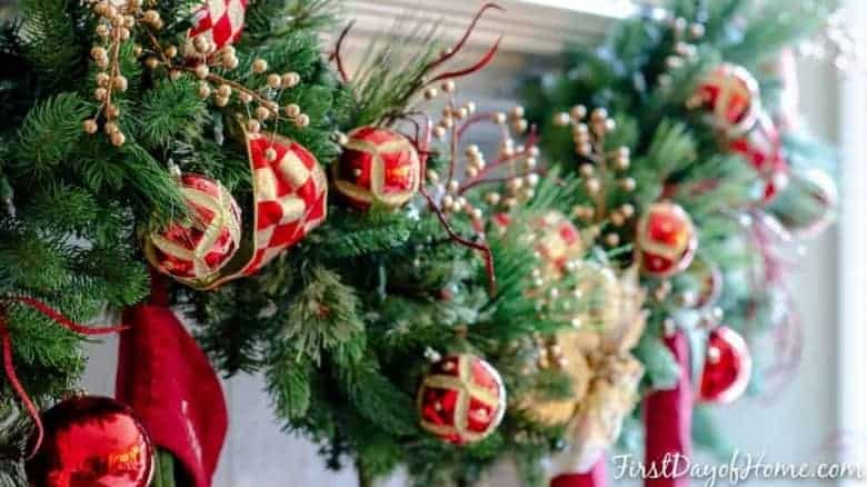 Fresh tree with red and gold ornaments