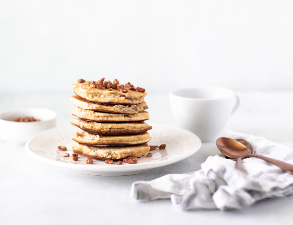 Full stack of keto pancakes, fresh cup of coffee