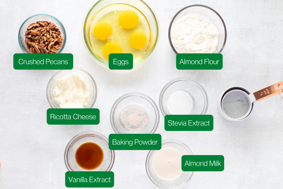 Ingredients used in keto pancakes (pecans, eggs, almond flour, ricotta cheese, baking powder, stevia extract, vanilla extract, almond mix