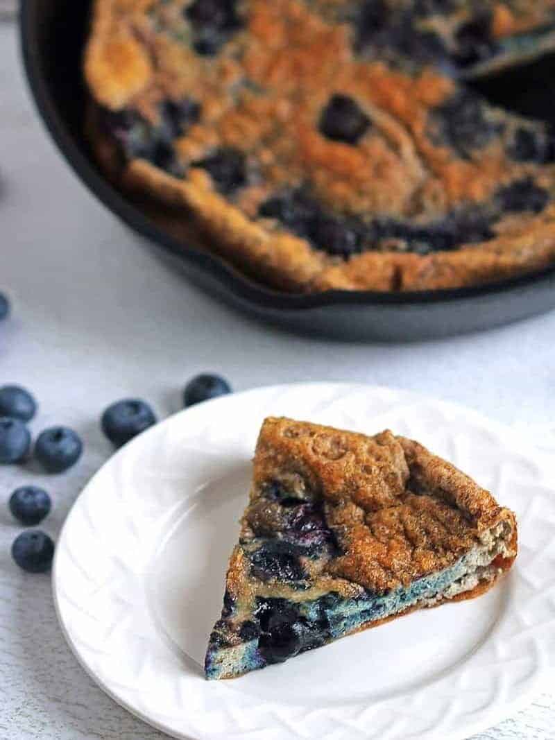 Blueberry Egg Strata 1 blueberry egg strata on plate and skillet