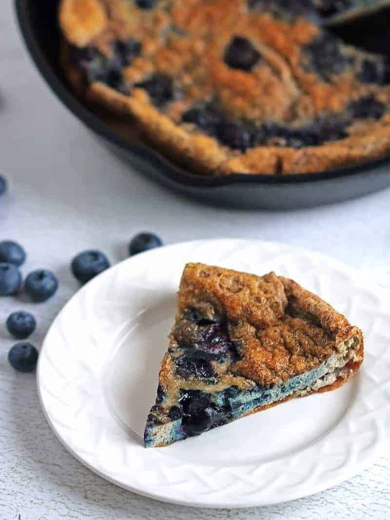 Blueberry Egg Strata 3 blueberry egg strata on plate and skillet