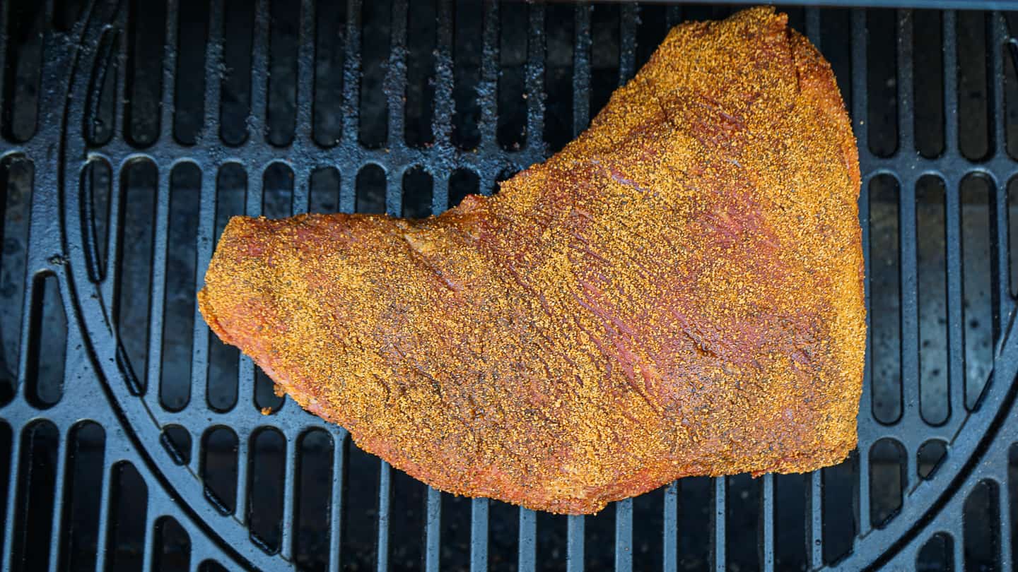 Place tri-tip in the middle of the grill and insert the meat thermometer. Smoke for around 3 hours until you reach the target temperature of 165ºF (74ºC).