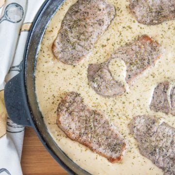 Creamy Smothered Pork Chops in skillet