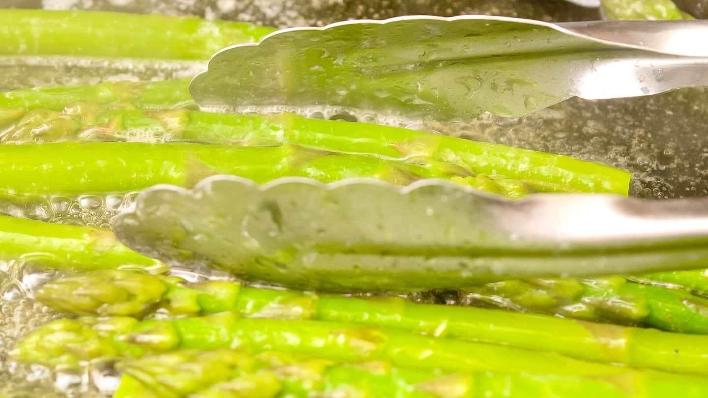  asparagus cooking in skillet