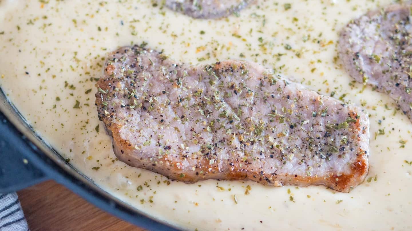 one piece of creamy smothered pork Chop 