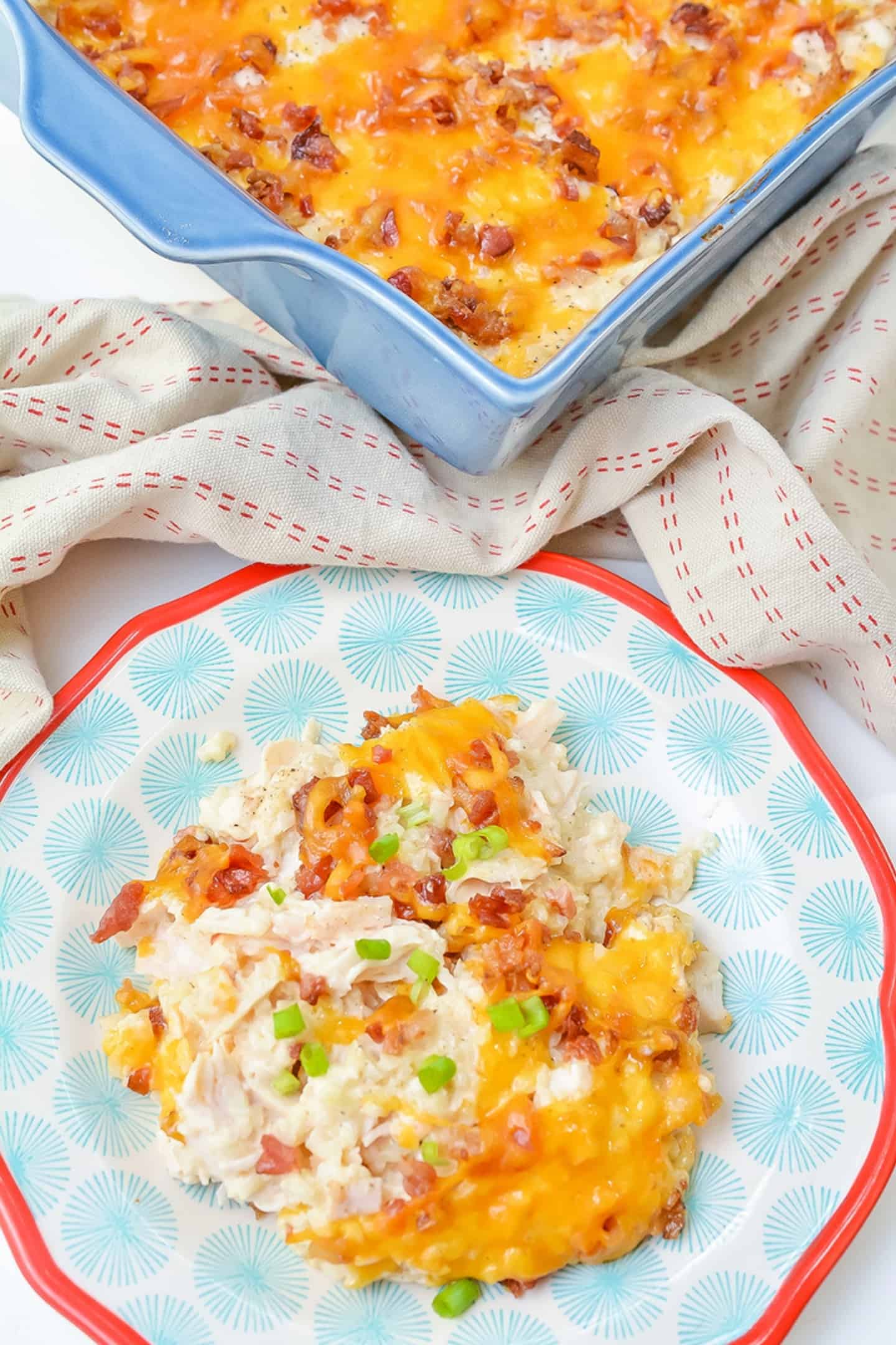 cauliflower casserole with  chicken  and cheese and onion leaves on top