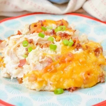 cauliflower casserole with cheese and onion leaves on top