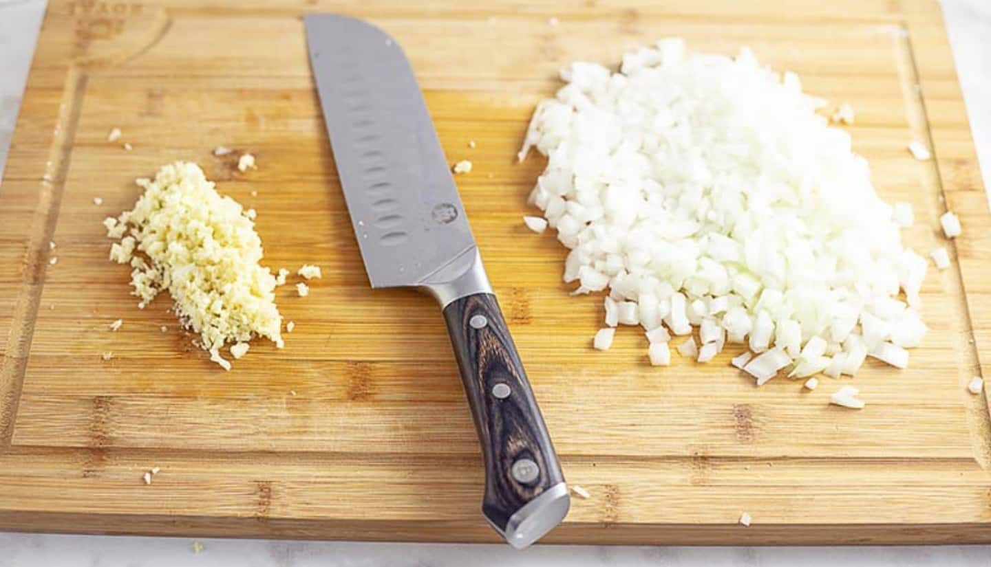 garlic and onions and knife