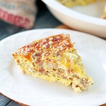 one slice keto breakfast casserole serve in a white plate