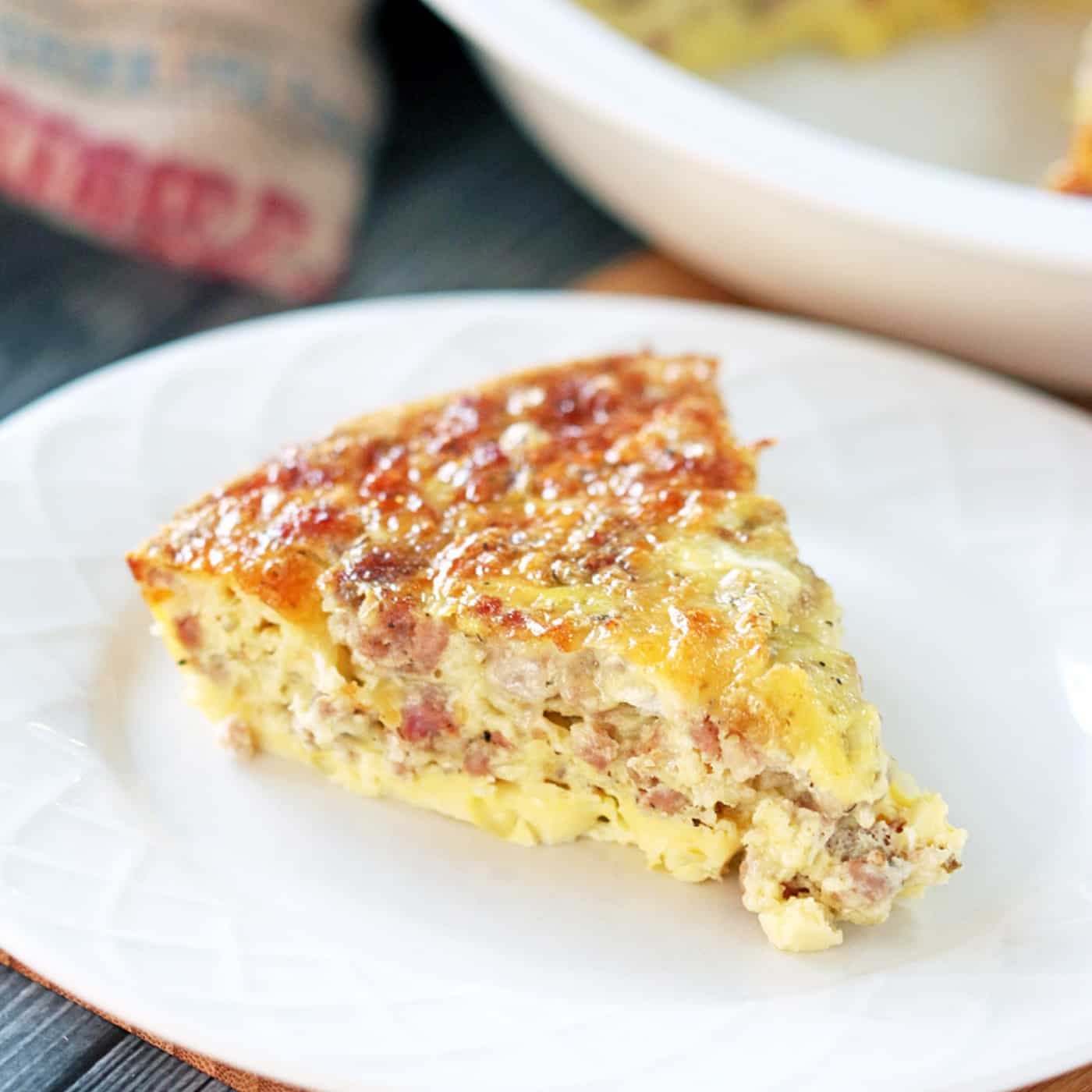 keto breakfast casserole slice serve in a white plate