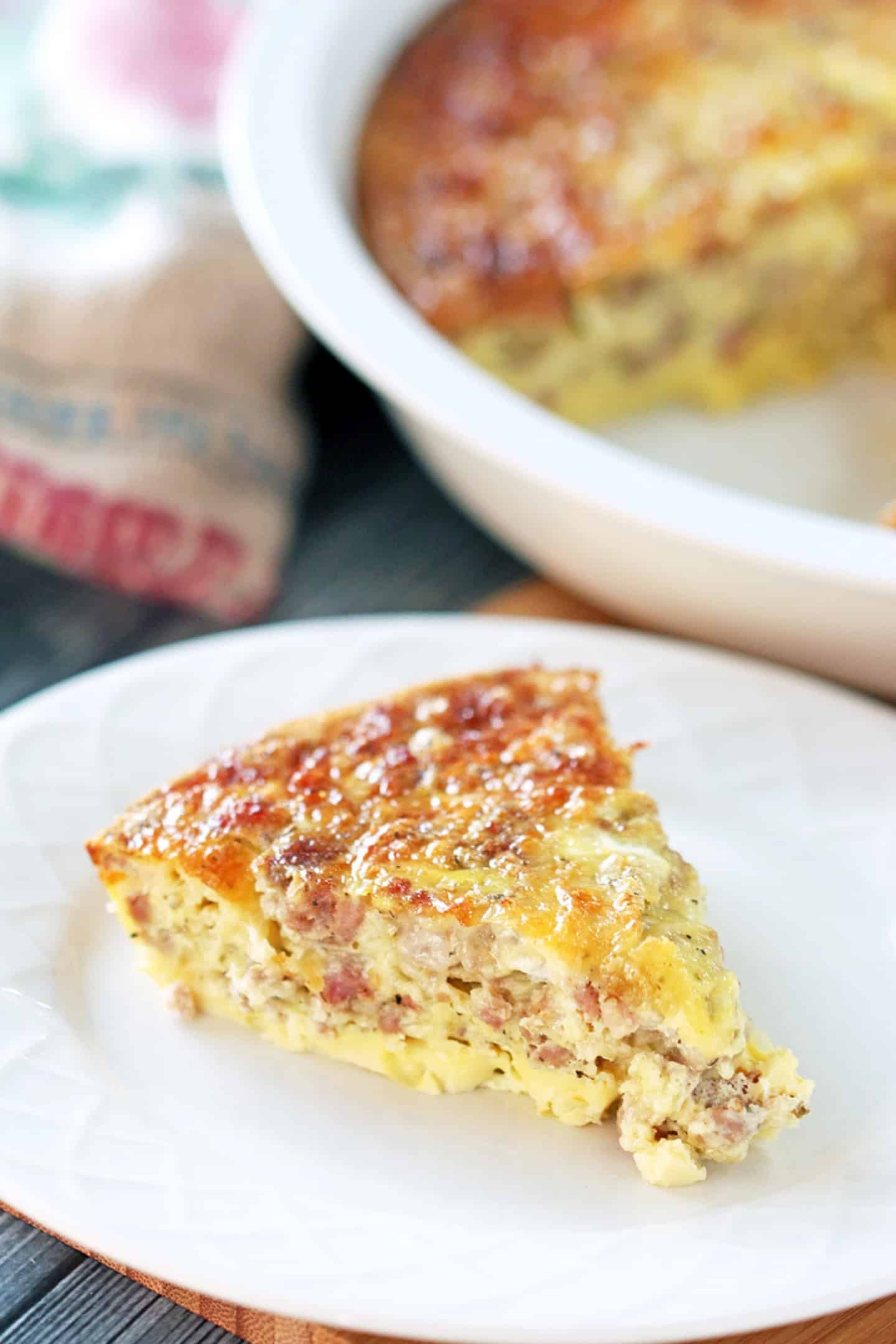 one slice keto breakfast casserole serve in a white plate