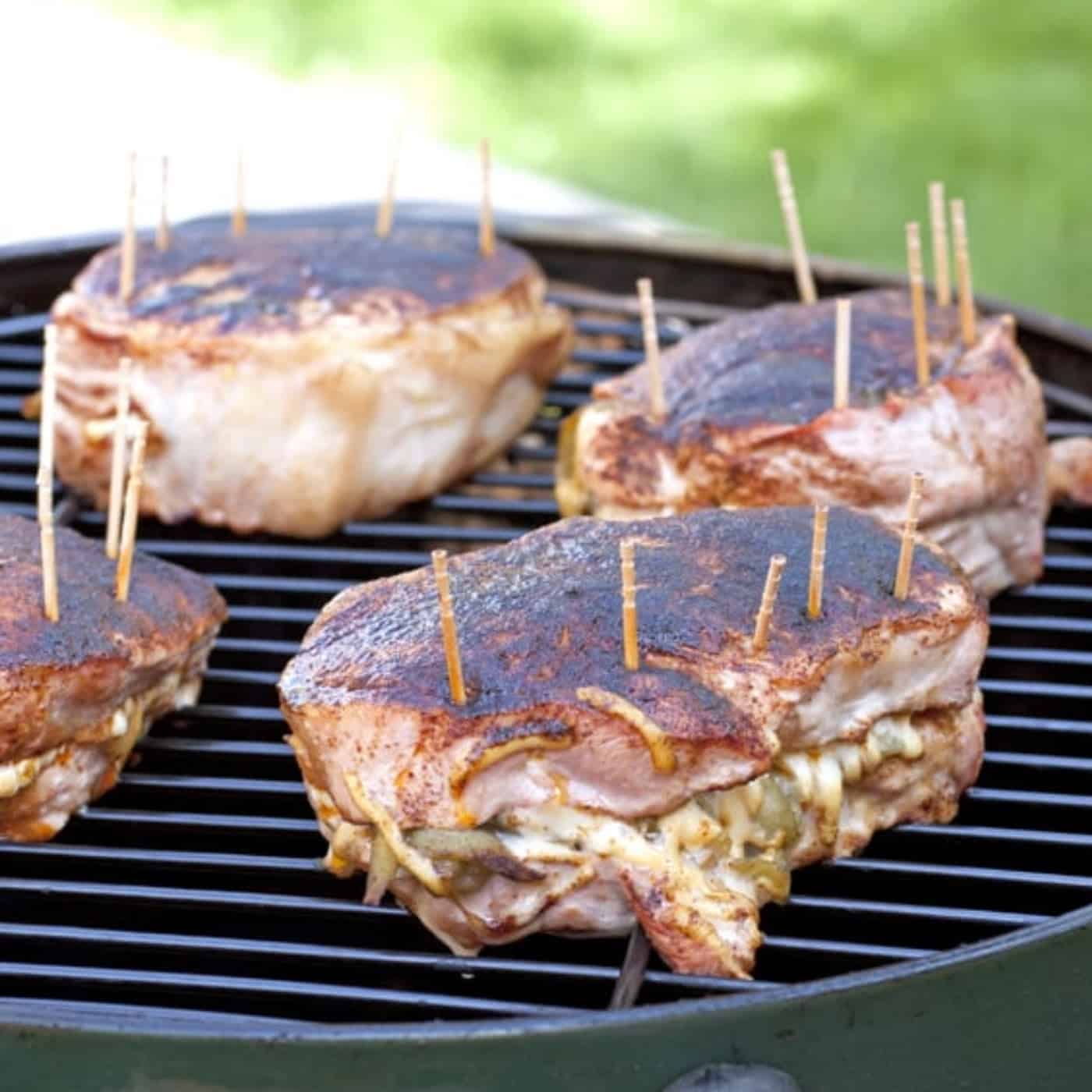 Smoked pork chops stuffed with Oaxaca cheese and green chile