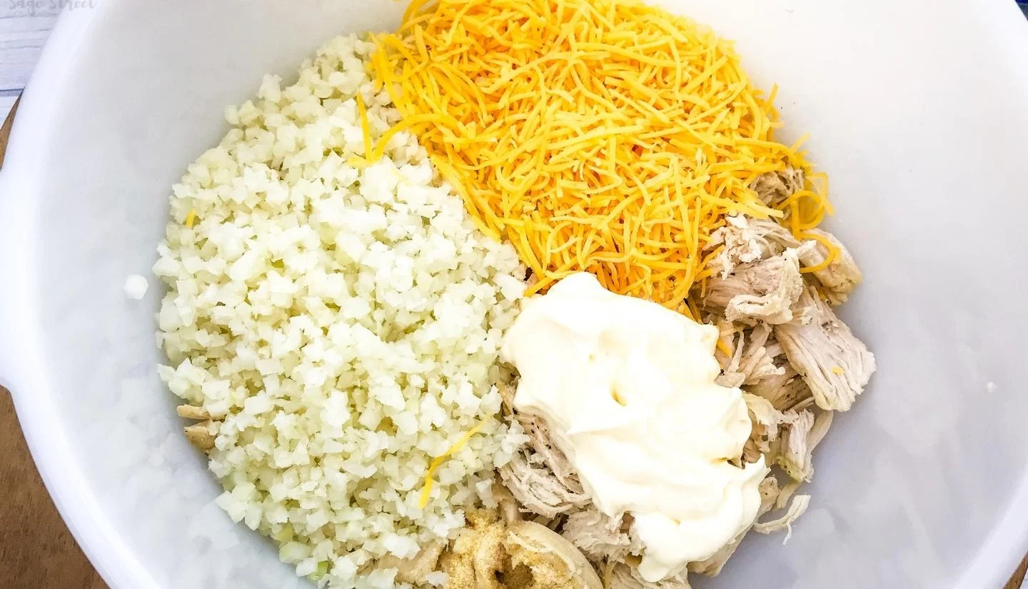 mixture of cauliflower rice, cheddar cheese chicken and cream cheese