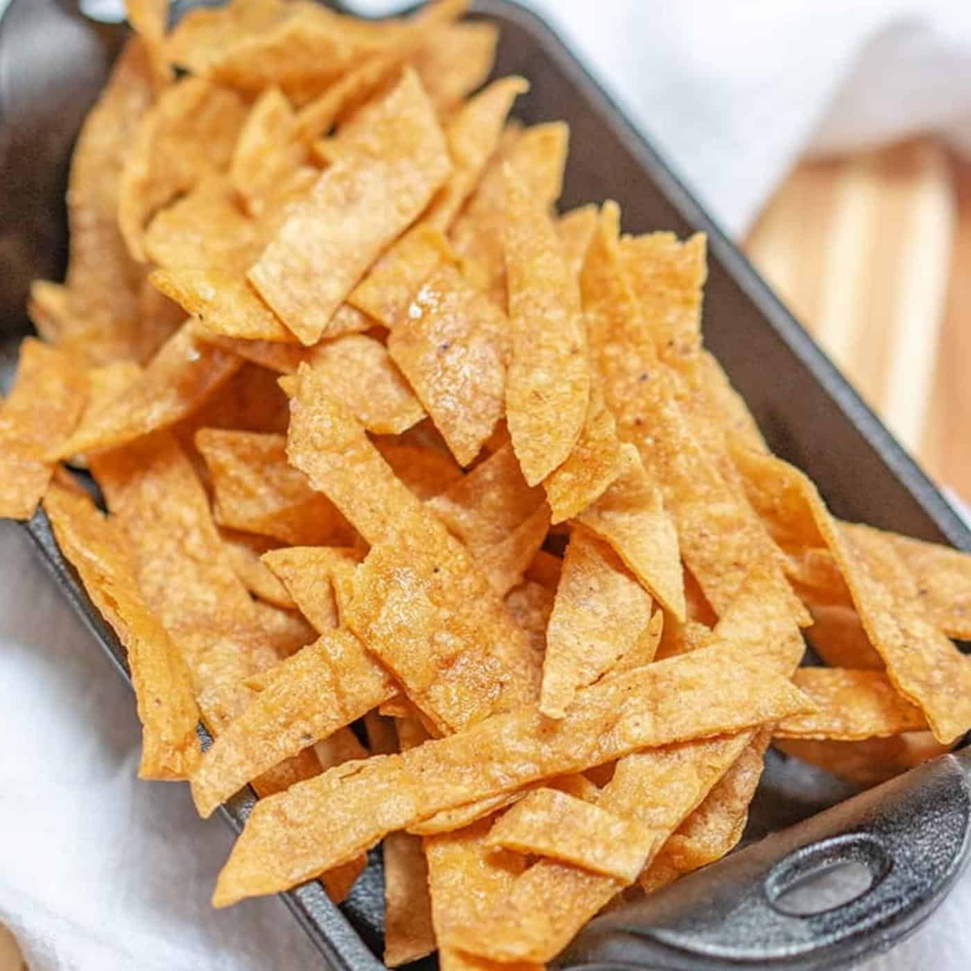 tortilla strips serve in a baking pan