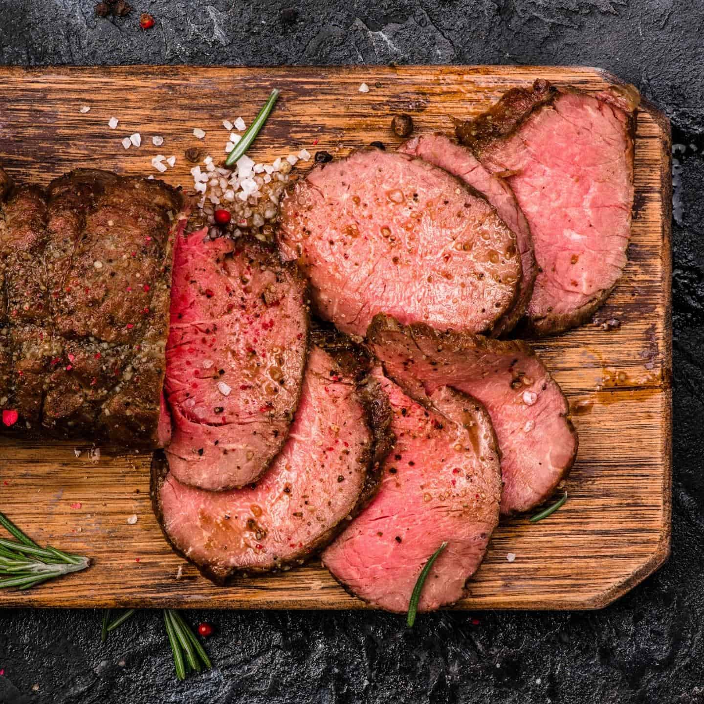 roast beef cooked to medium rare using low and slow cooking method