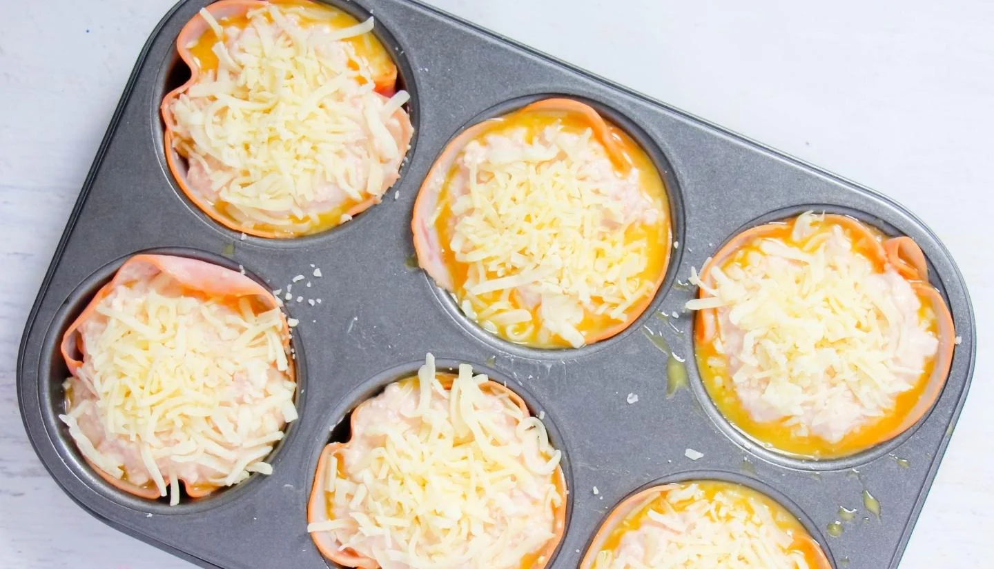 sausage muffins with cheese on top