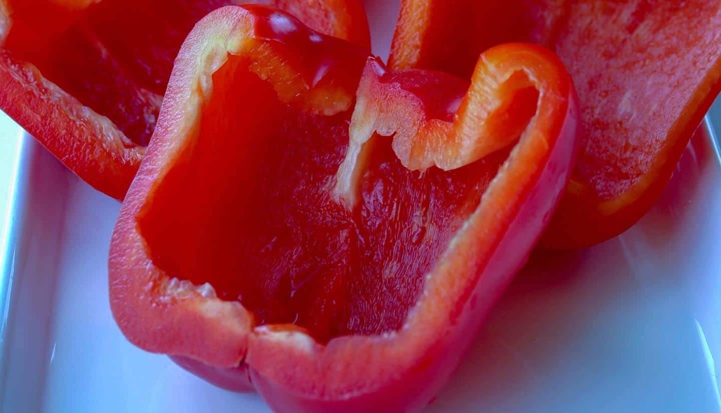 red bell peppers cut in halh