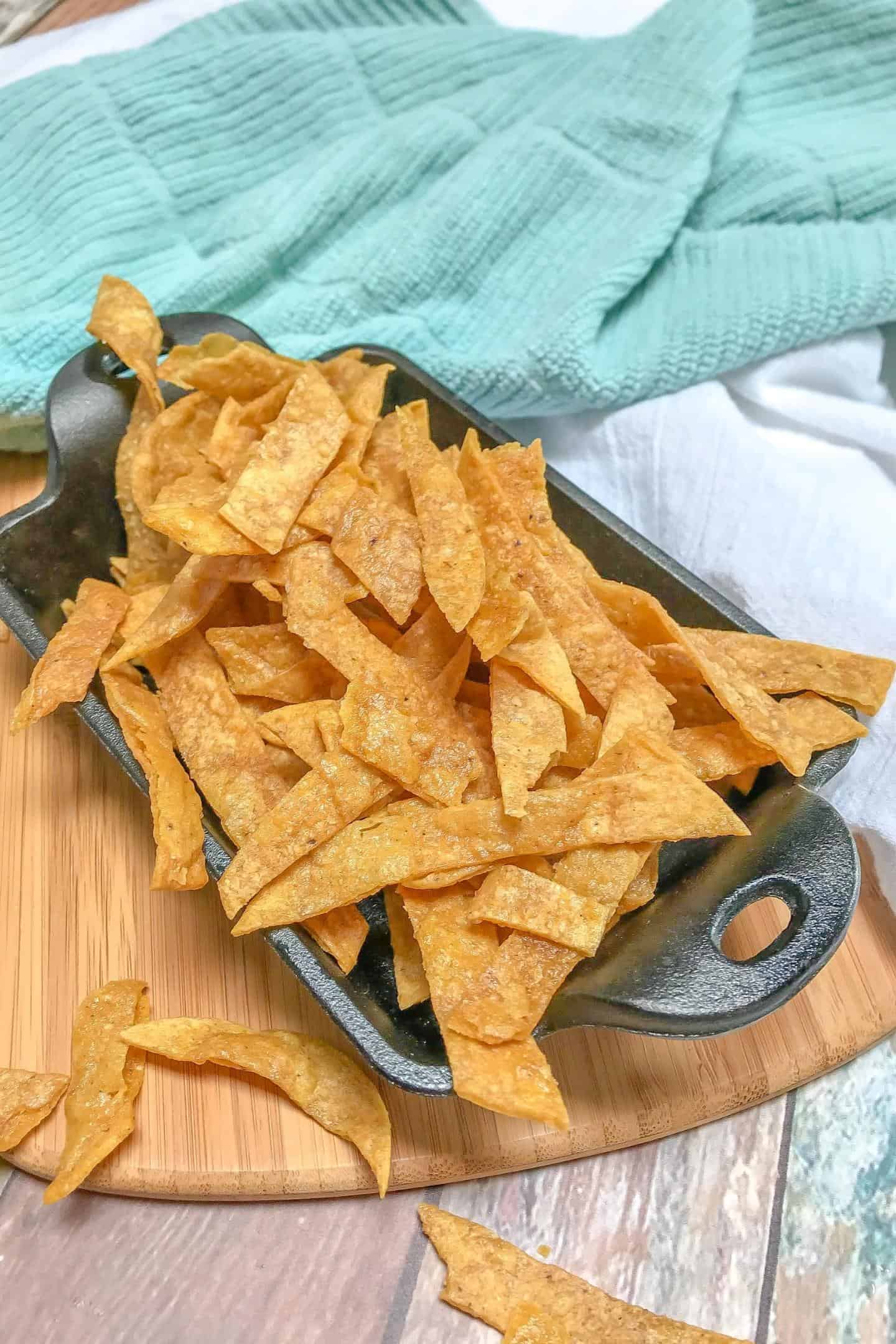 tortilla strips serve in a baking pan