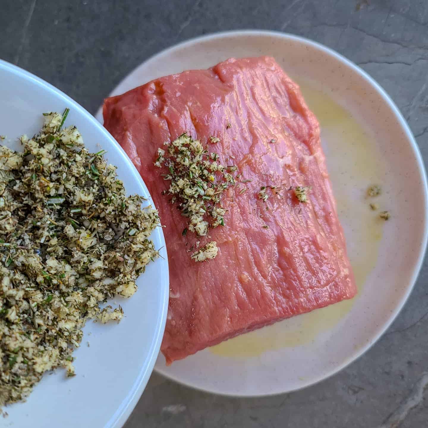 Add seasoning and rub all sides to ensure seasoning sticks to the roast.