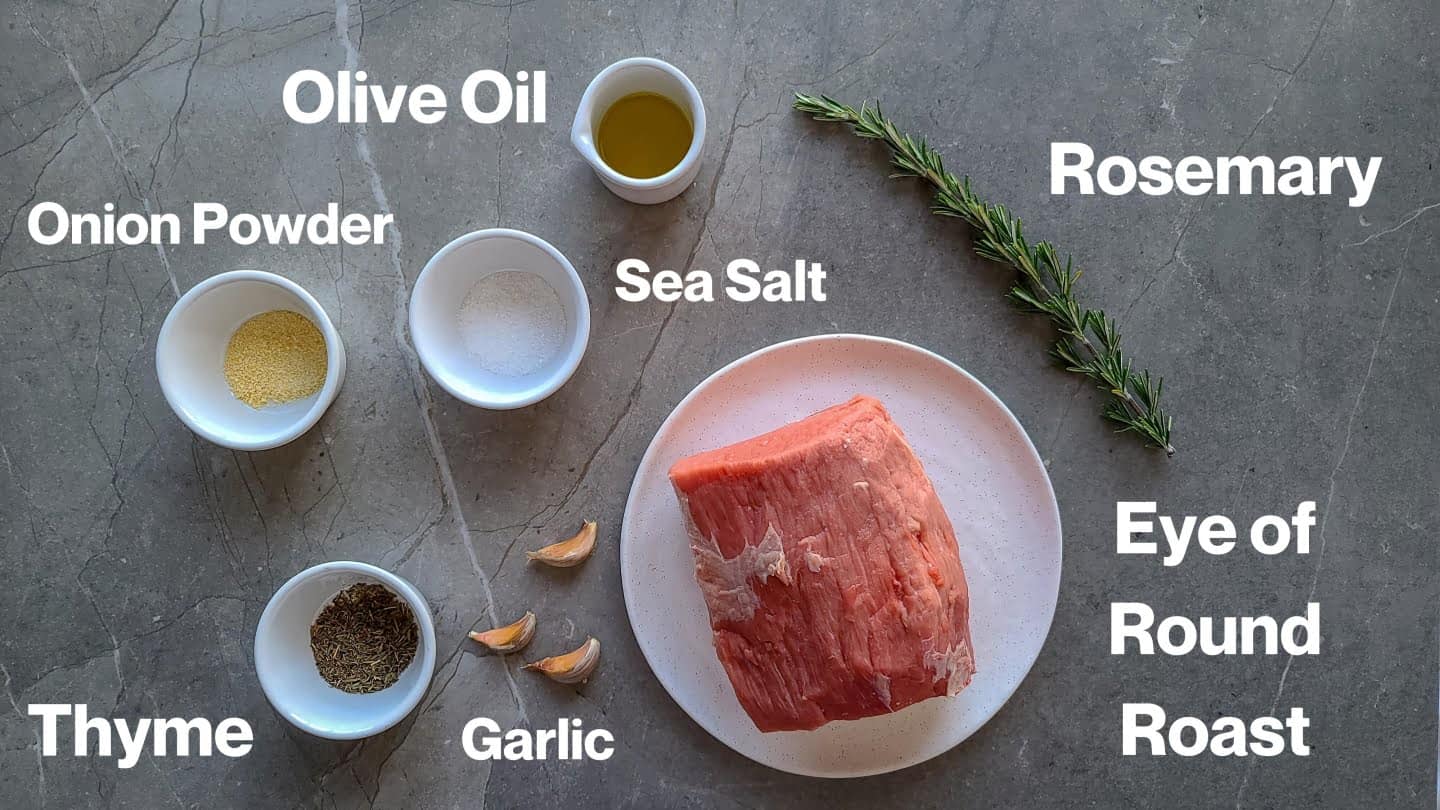 Eye of round roast ingredients: Olive oil, rosemary, onion powder, thyme, garlic, and eye of round roast.