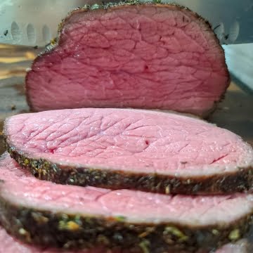 slicing the bottom round roast